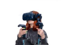 Girl plays VR game