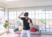 Man wearing VR headset in living room